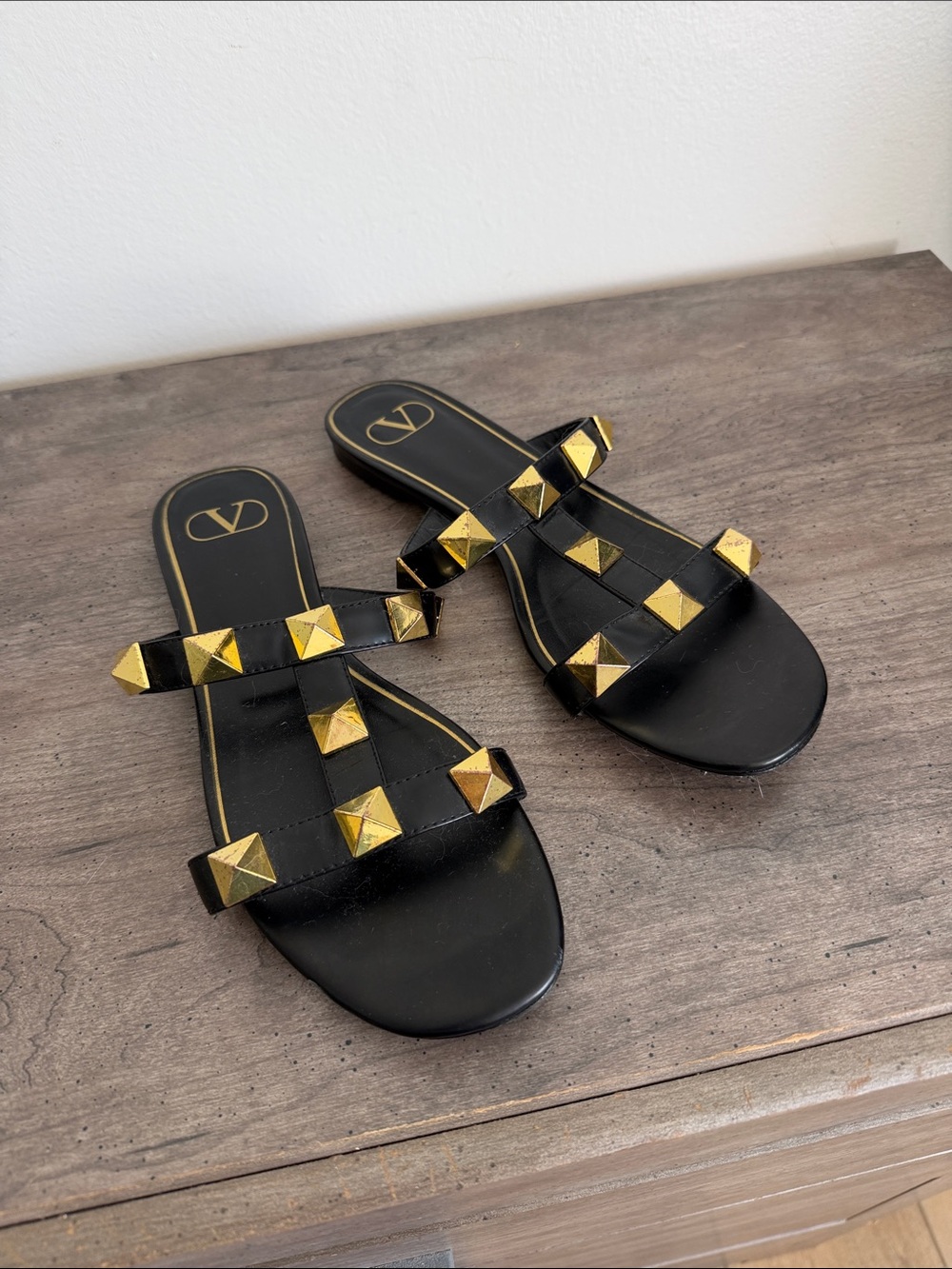 Valentino Black Leather Slide Sandals with Gold Pyramid Studs